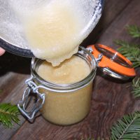 Packaging up homemade sugar scrub in a one cup weck jar with clasp.