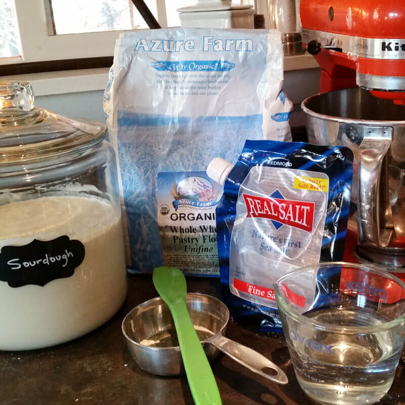 Homemade Sourdough Bread Ingredients: Sourdough starter, flour, sea salt, water, measuring cups, spatula and kitchen aid mixer.