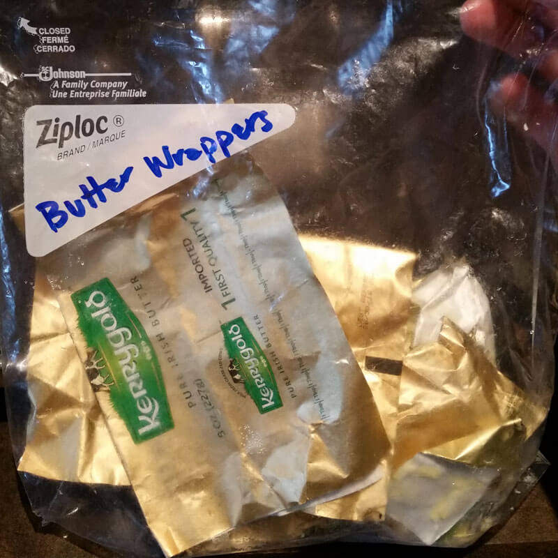 Butter wrappers saved in a ziplock back in the freezer are the perfect way to grease a bread pan.