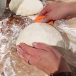 Loosely form each dough ball into a loose round, creating surface tension as you work the dough.