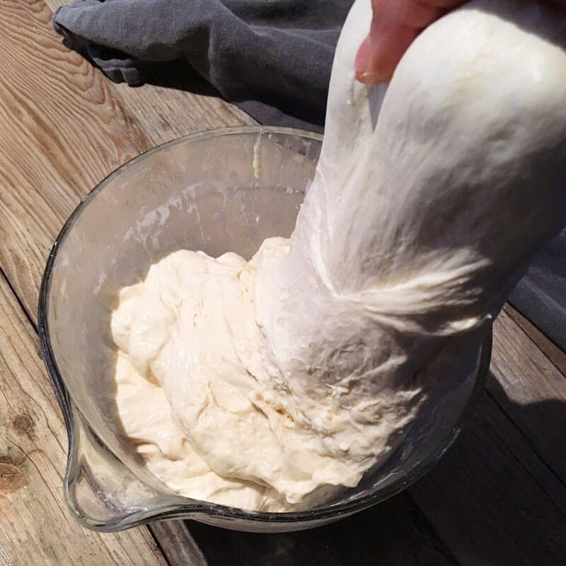 Repeat the stretch and fold every 30 minutes for 2 1/2 hours. The dough will get smooth and very elastic toward the end of your stretch and folds.