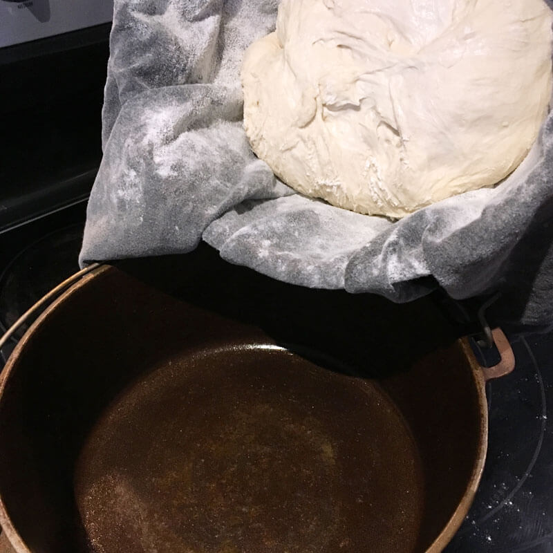 Transfer dough to a preheated Dutch oven.