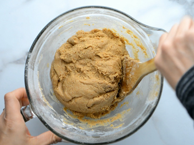 Perfectly mixed Perfectly mixed homemade graham cracker dough. Not too sticky, but firm enough to roll out.homemade graham cracker dough.